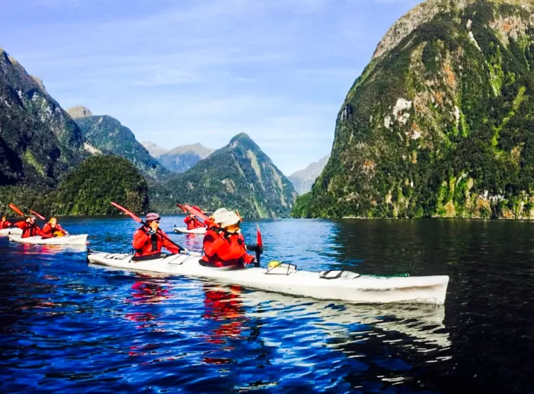 View of kayakers in Doubtful Sound