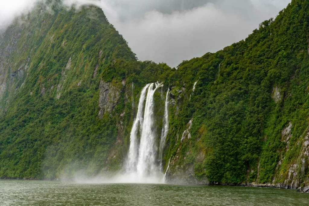 Waterfall cascasding from mountain in Fiordland